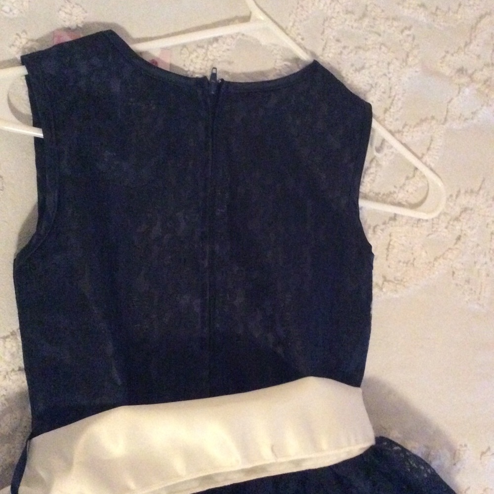 Girls dress size 12 , Navy blue w cream sash .